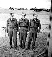 outside "B"Flight hangar about July '43,the three of us,I forget the fellows name on the left but the other is Arnold Pearson and myself,then Arnold and Davie Dunlop.