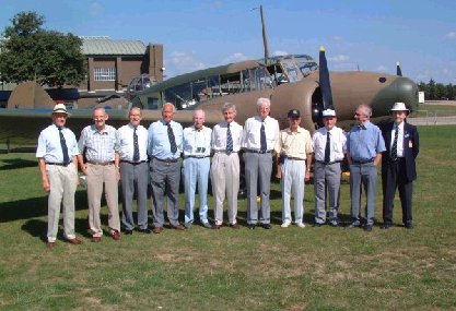 N4877 From left to right: Jack Warwick, Arnold Gentry, Bill Corless, Sir John Curtiss, Gron Edwards (who amassed 850 hours on Ansons in 1937 - 40), Jack Hoskins, Ray Tagli, Don Forryan, Eric Smith, Fred Jenkinson and Peter Rackliff.